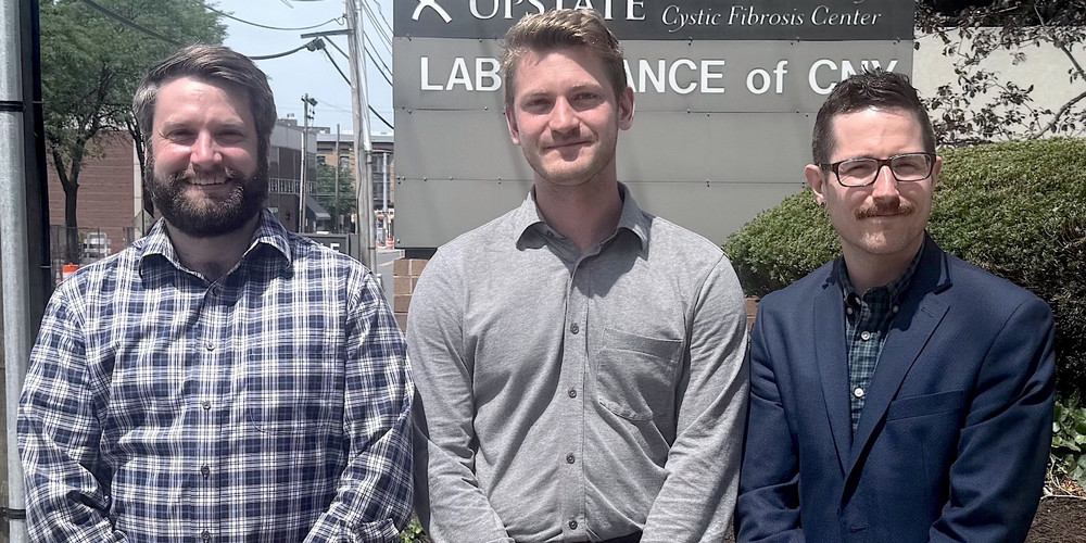 Brendan Merhab with Drs. Courtney Mauzy and Andrew Craig outside the Golisano Center for Special Needs